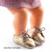 Golden Pair of Baby Doll Shoes from Pomea by Djeco - 2